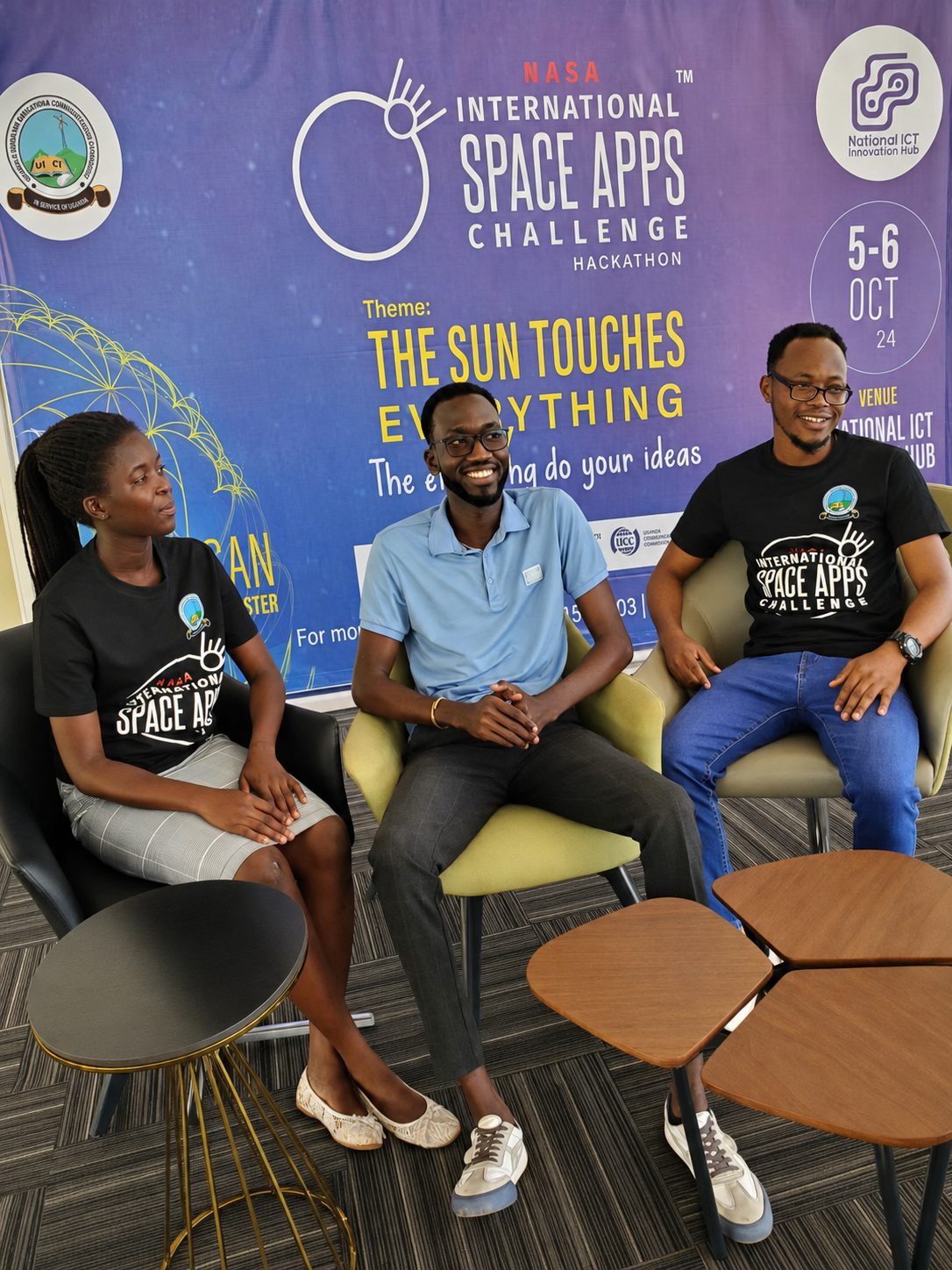 Charles Oriokot with two teammates at the 2024 NASA International Space Apps Challenge in Kampala